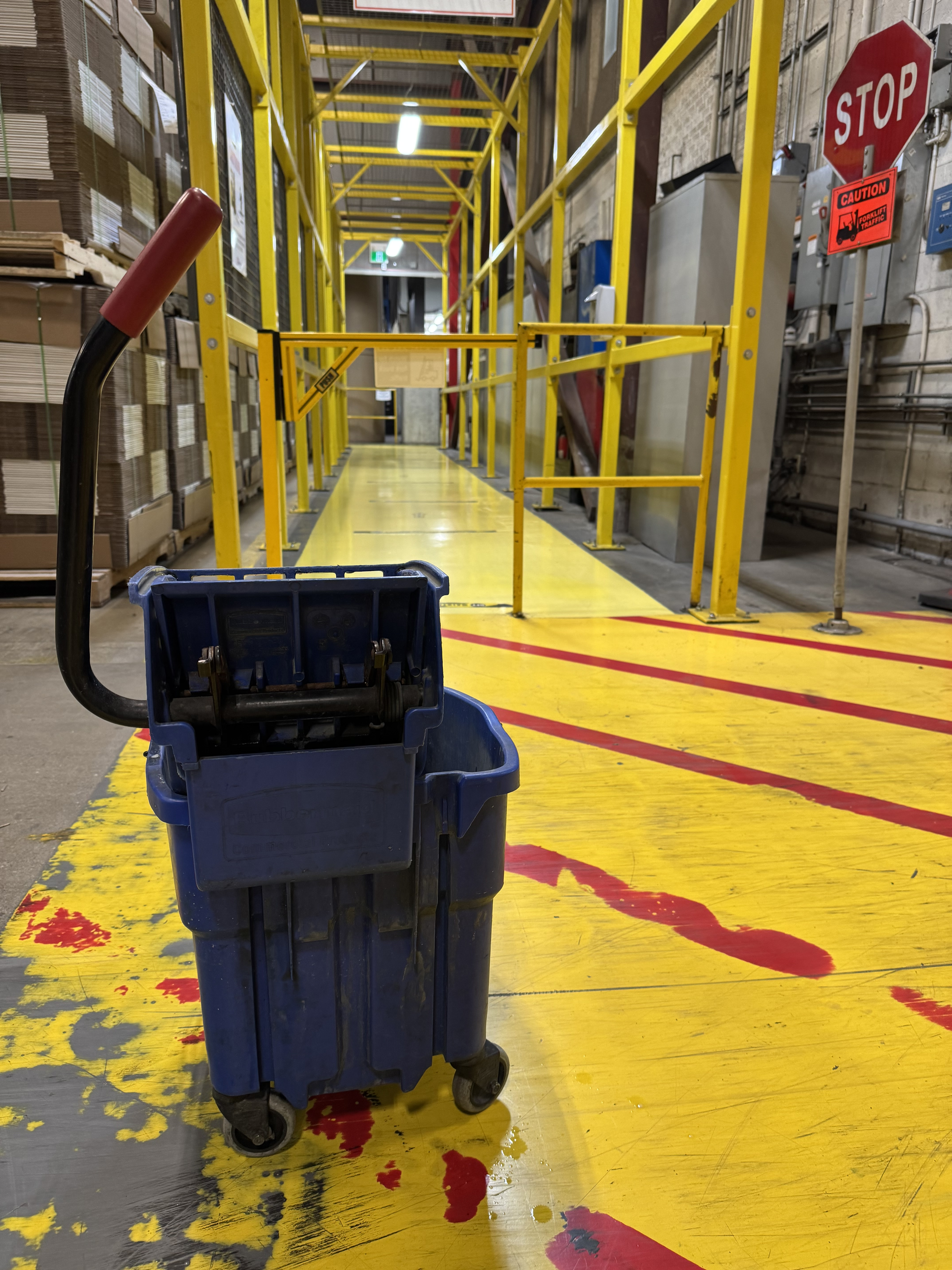 Cleaning crew wiping down stainless steel surfaces