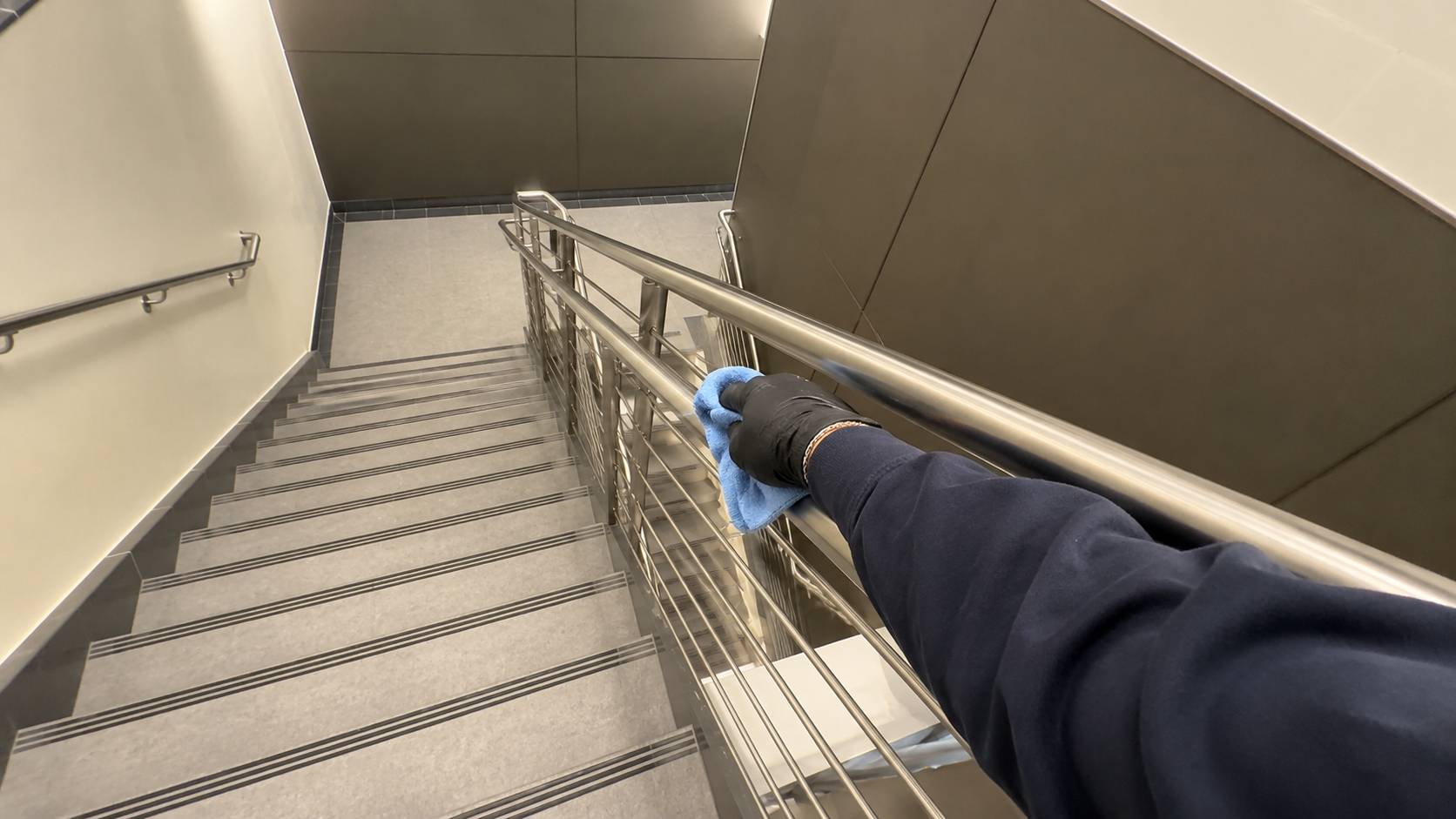 Commercial stair rail cleaning